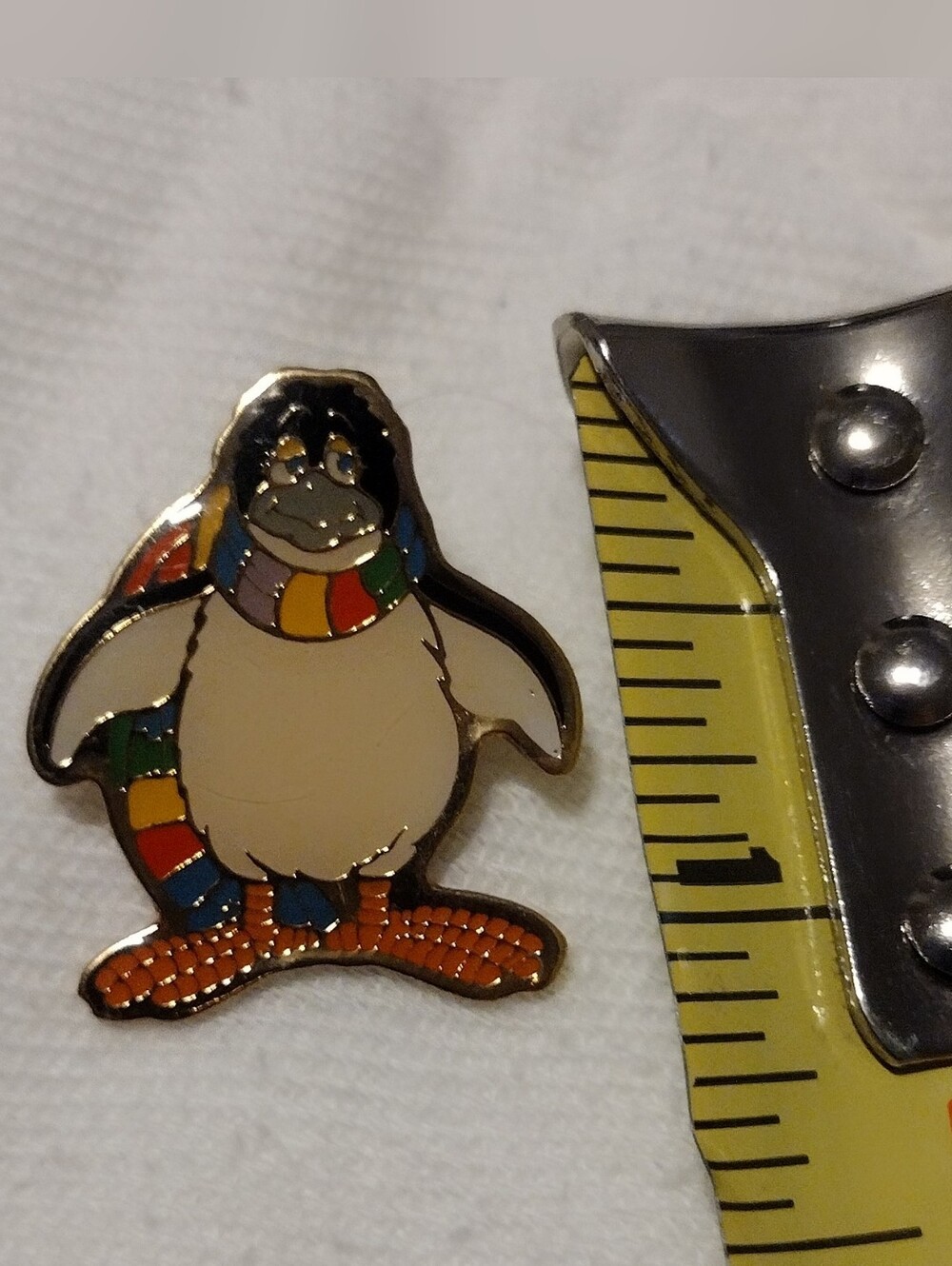 Penny Penguin Sea World Vintage Enamel Pin with Rainbow Scarf 1989